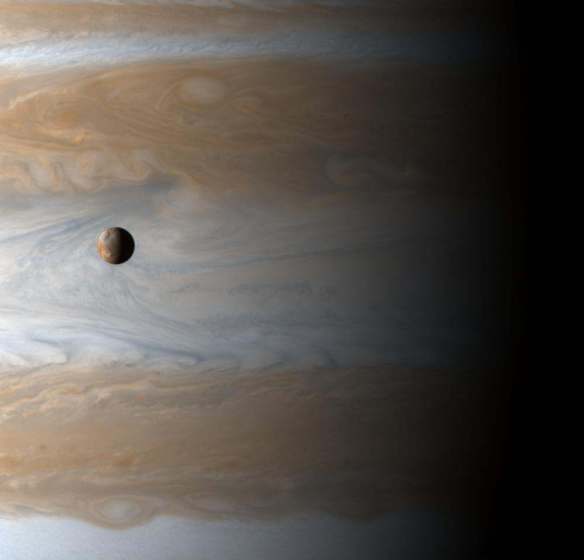Jupiter and Io captured by space probe Cassini